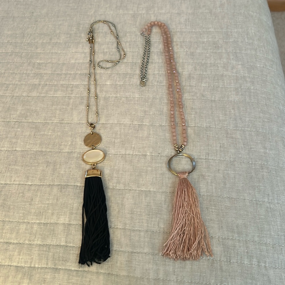 Set of tassel necklaces.
